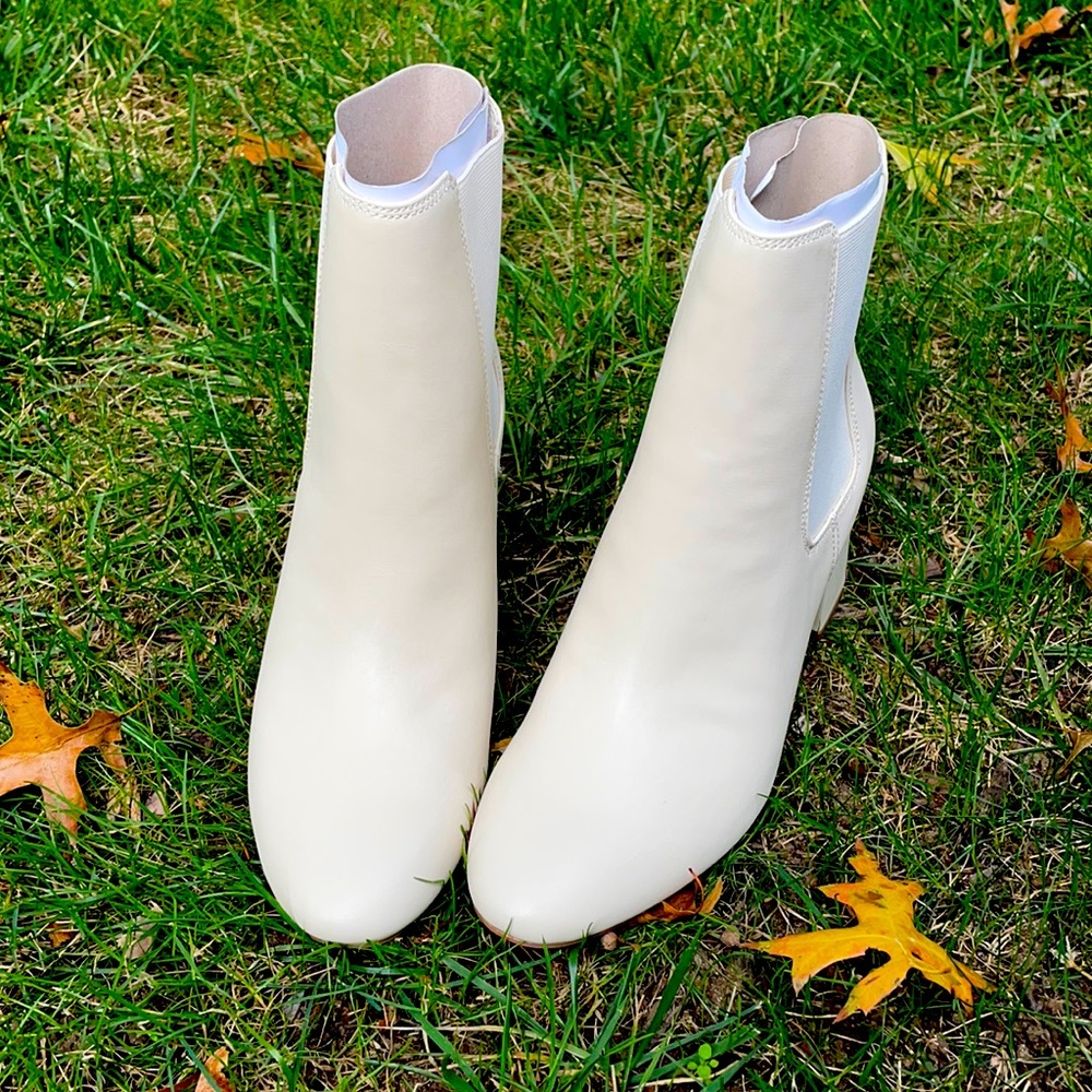 Bone color fall booties. Never used. Bought by mistake. No returns.